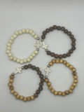 Wooden beaded cross bracelet.