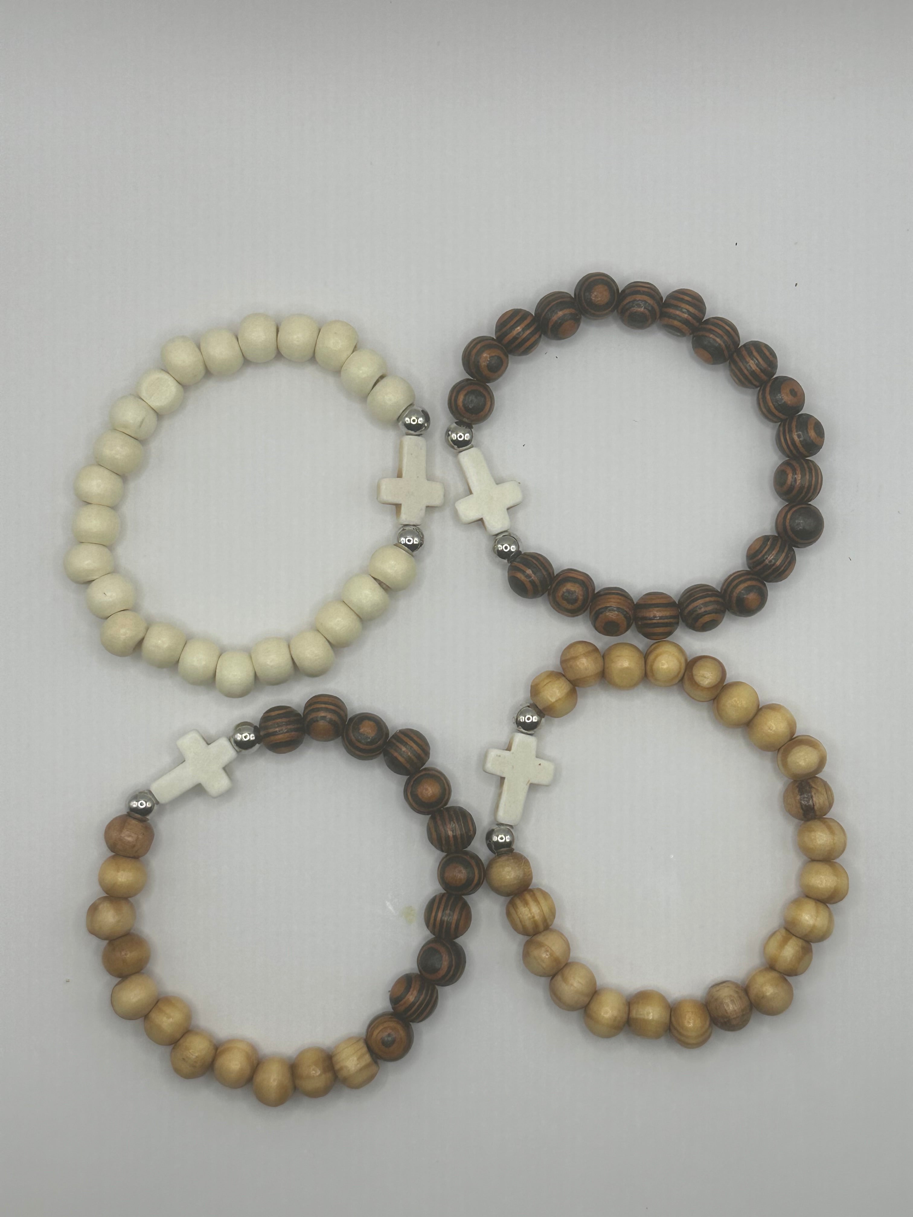Wooden beaded cross bracelet.